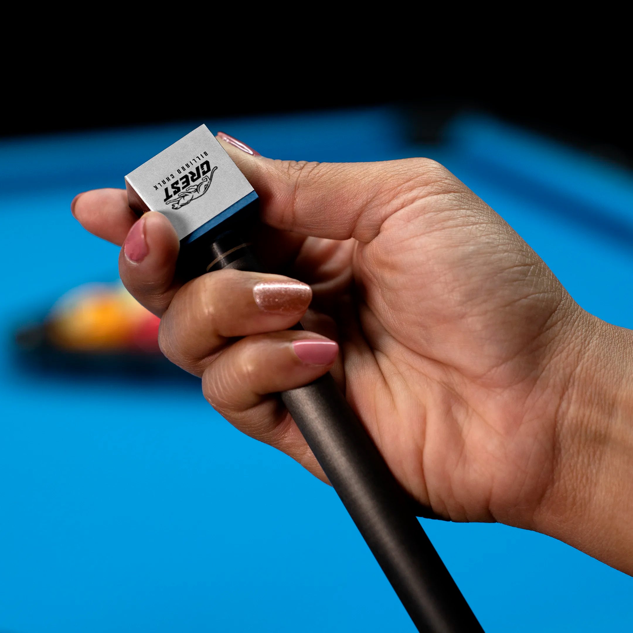 Crest billiard chalk being used