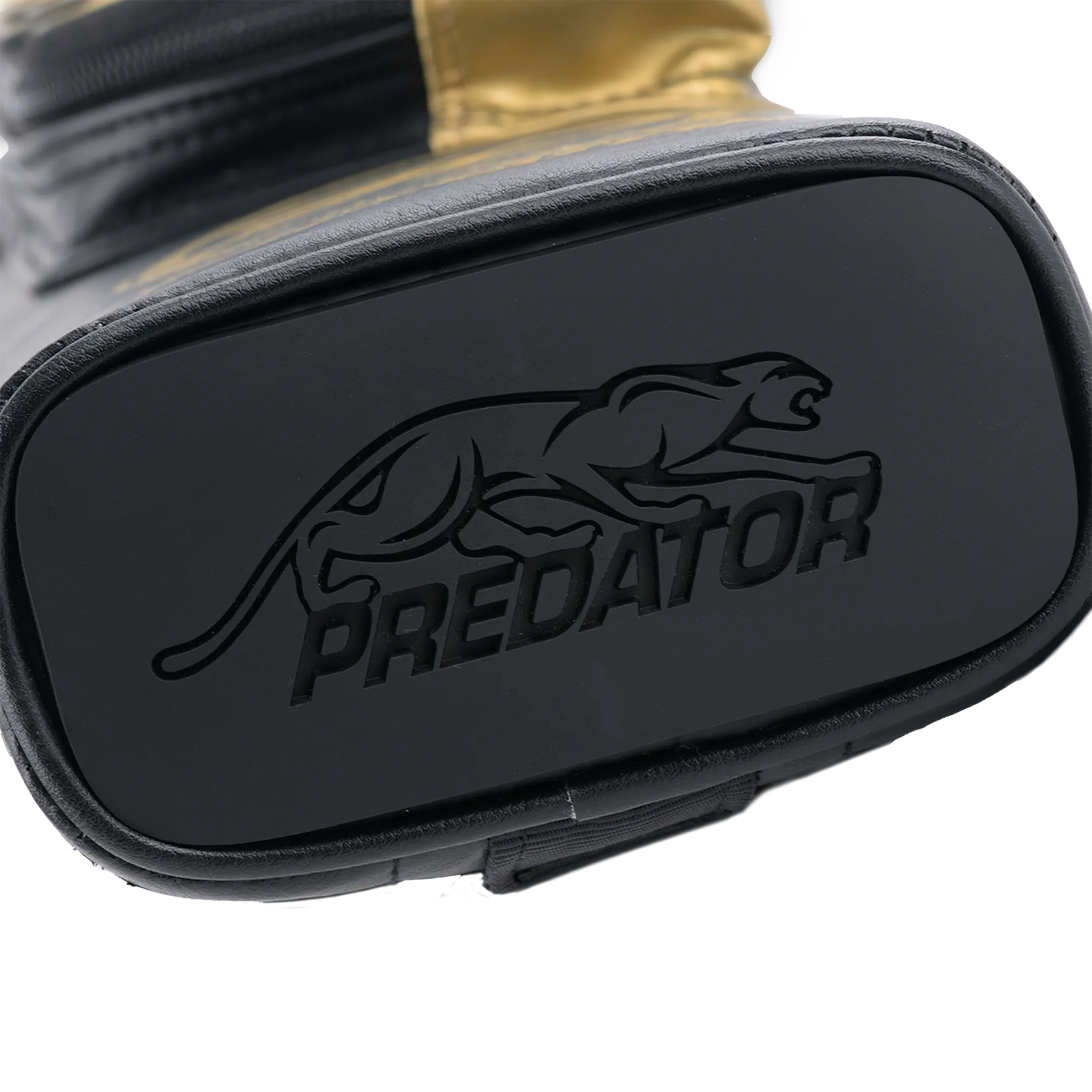 Close-up of a black and gold pool cue case bottom with 'Predator' branding.