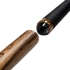 Matte wood cylindrical pool cue extension posed next to black pool cue butt.