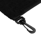Black towel with a black clip on a white background. 