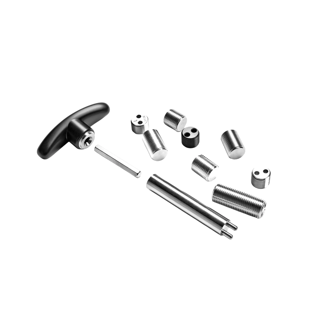 Set of metal tools and components on a white background.