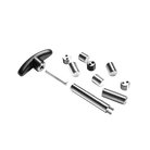 Set of metal tools and components on a white background.