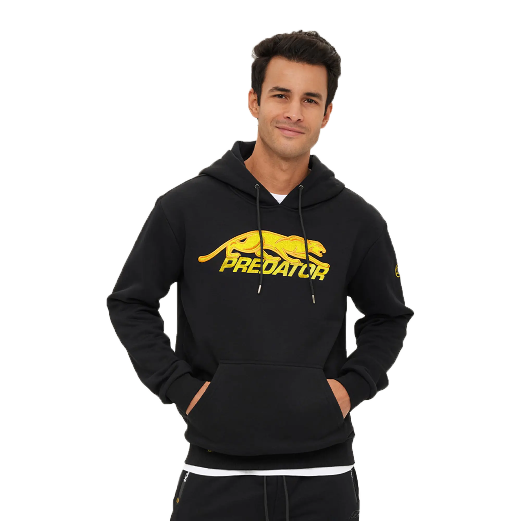 Man with brown hair wearing black hoodie with gold Predator logo against a white background.