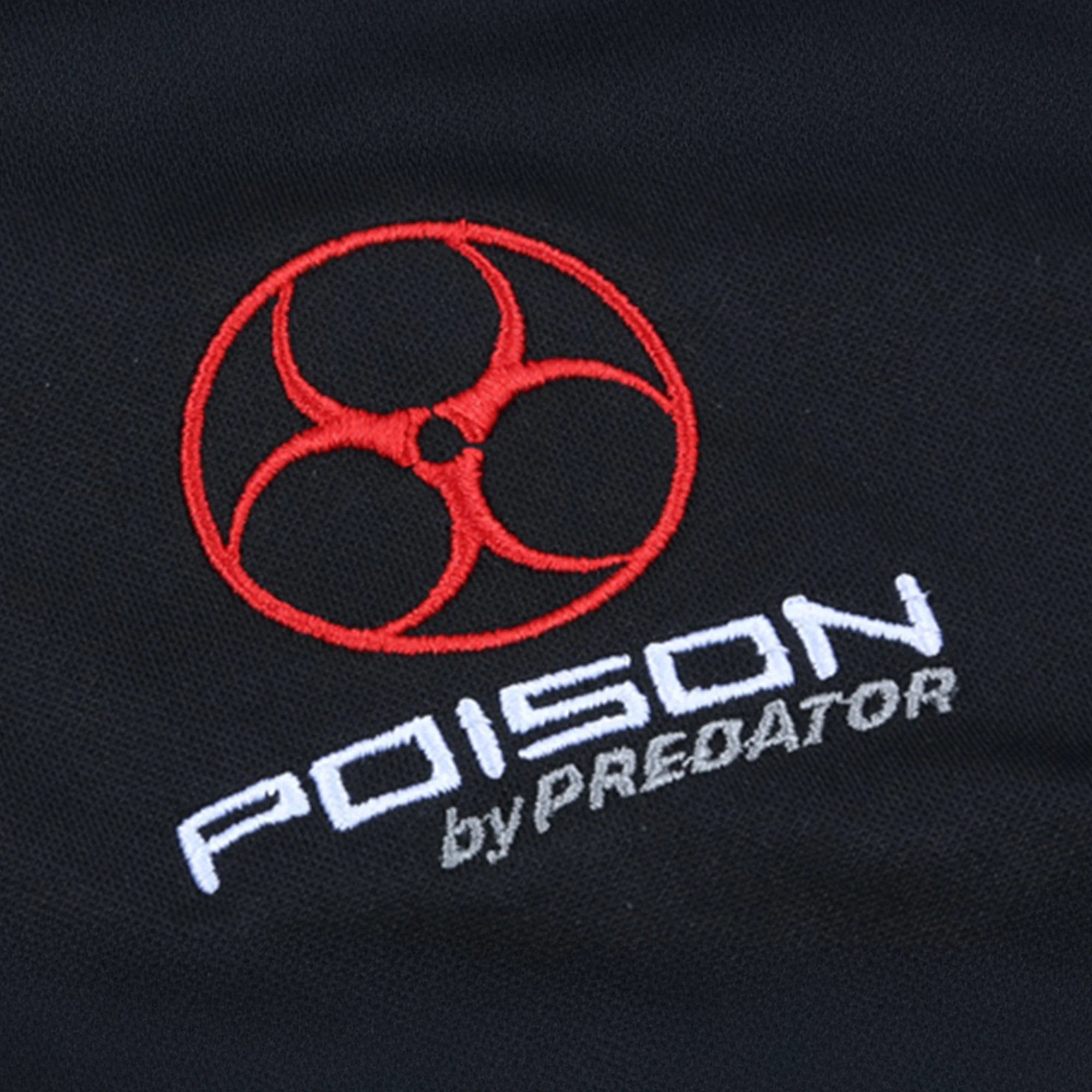 Red and white Poison by Predator logo against a black fabric background.