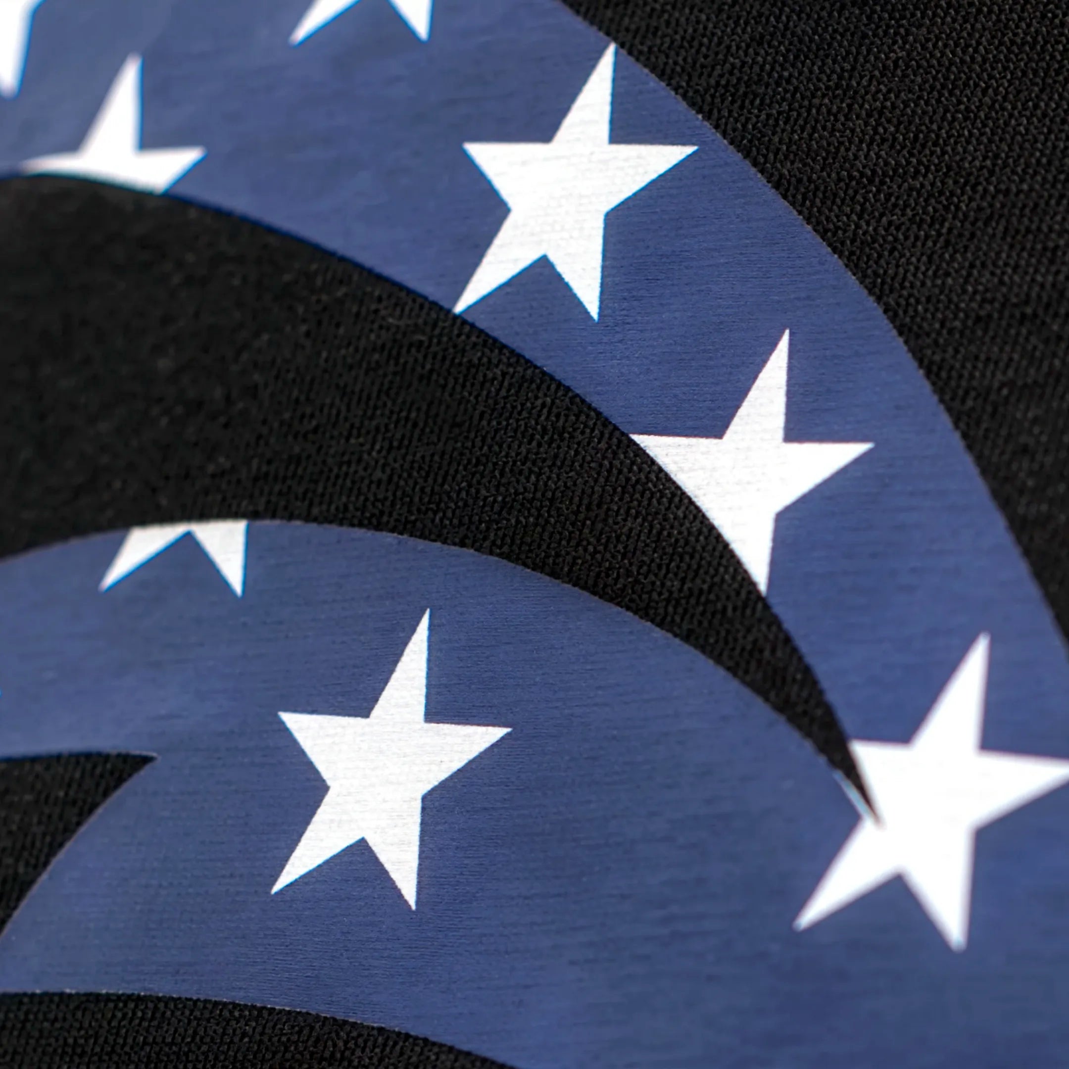 Close-up of a fabric with USA Cat head design