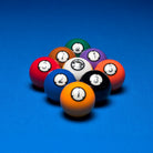 Set of billiard balls with numbers on a blue background