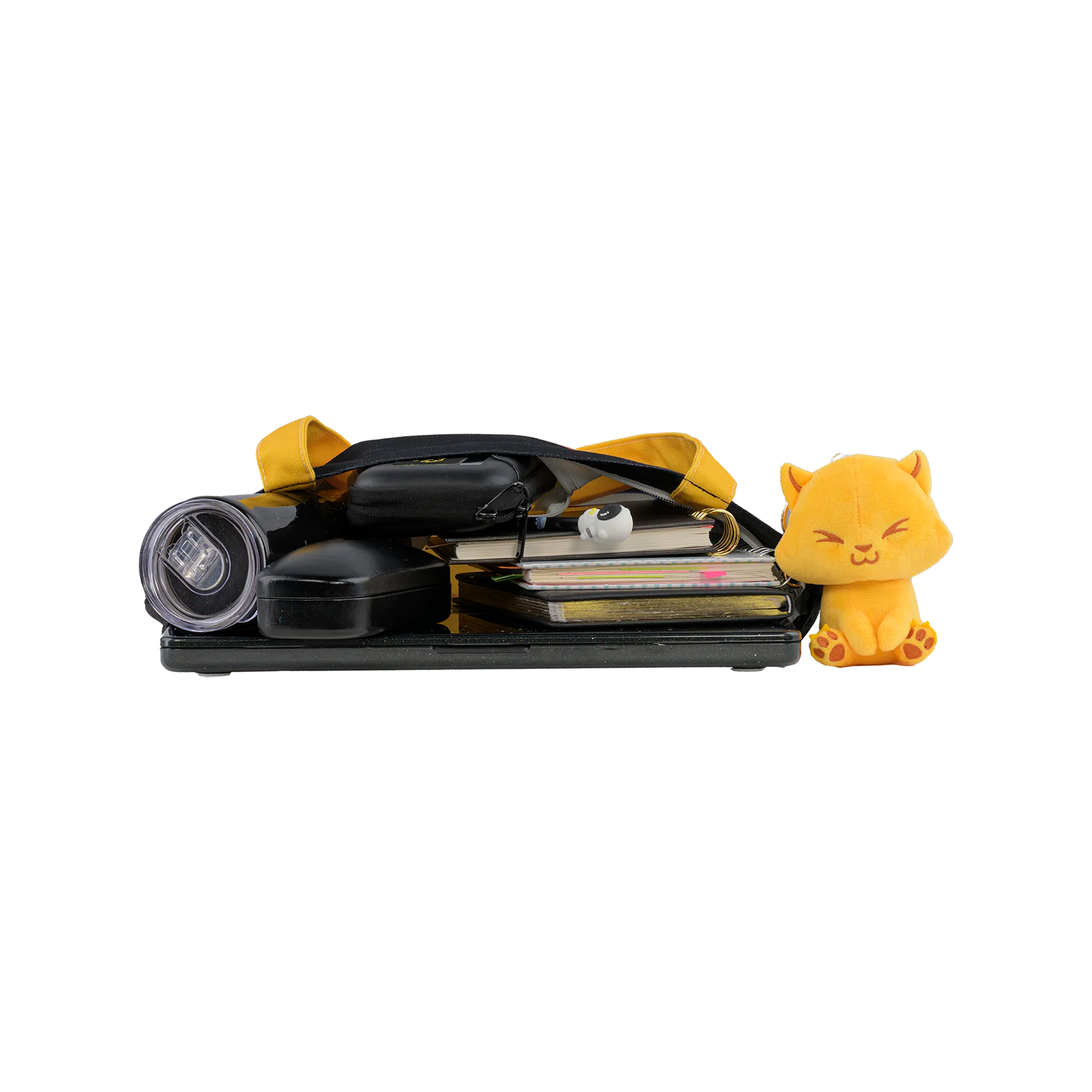 Collection of small items including a yellow cat figurine, camera lens, and compact mirror on a white background.