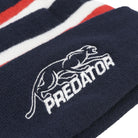 White embroidered Predator logo against a navy blue fabric background.