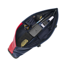 Unzipped blue and red pool cue case containing various PREDATOR branded accessories