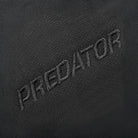 Embroidered 'Predator' logo on a black background.