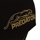 Close-up of black glove material with gold 'Predator' logo