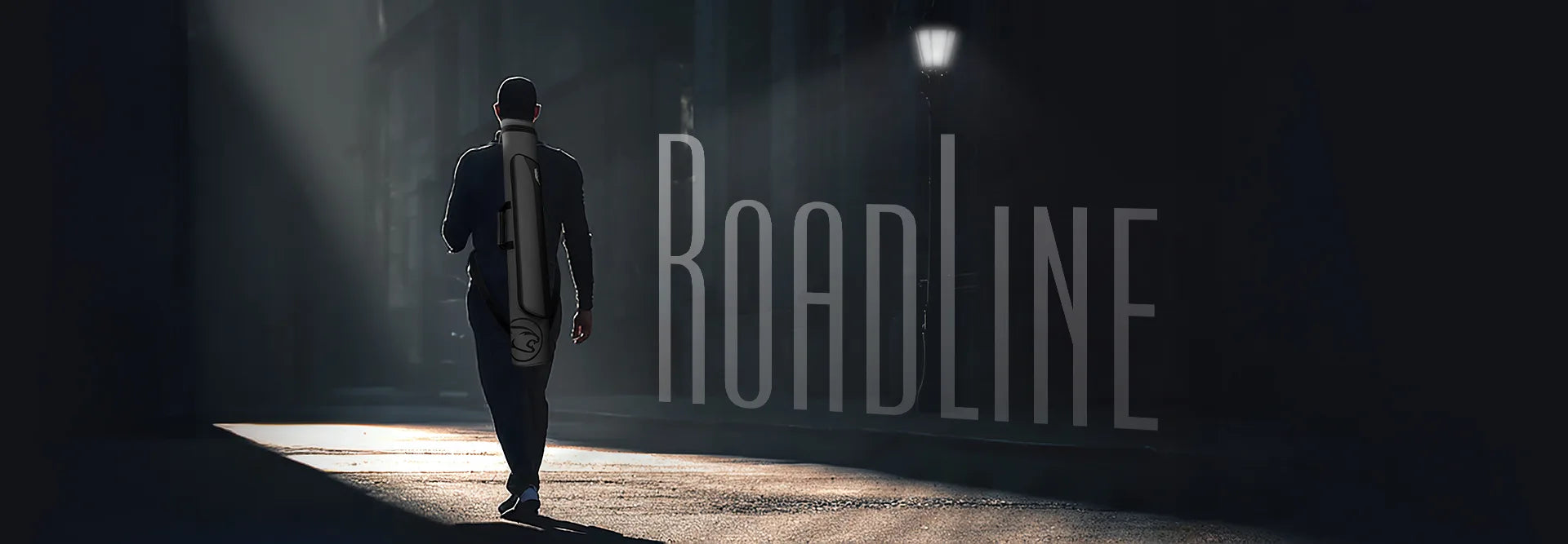 A person wearing a pool cue case is walking into a light at the end of a tunnel with 'Roadline' branding.