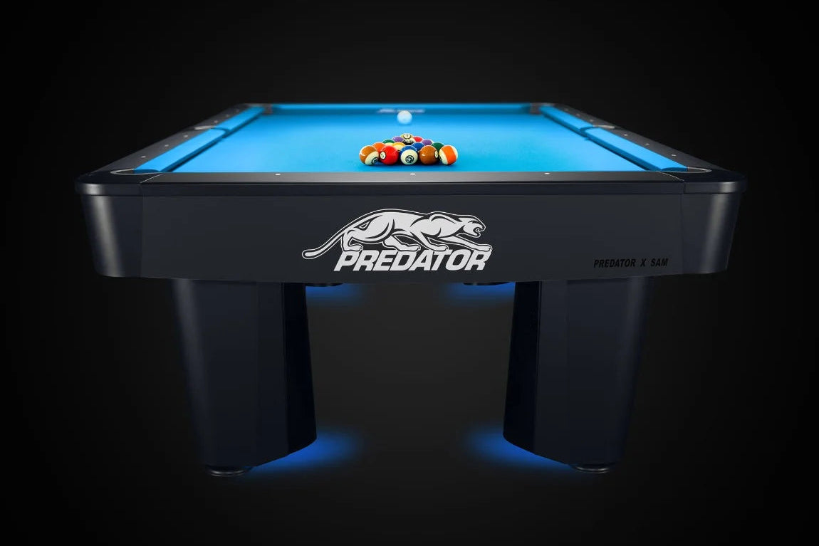 APEX Professional pool table view with the Predator logo in the front and pool balls racked on the table.