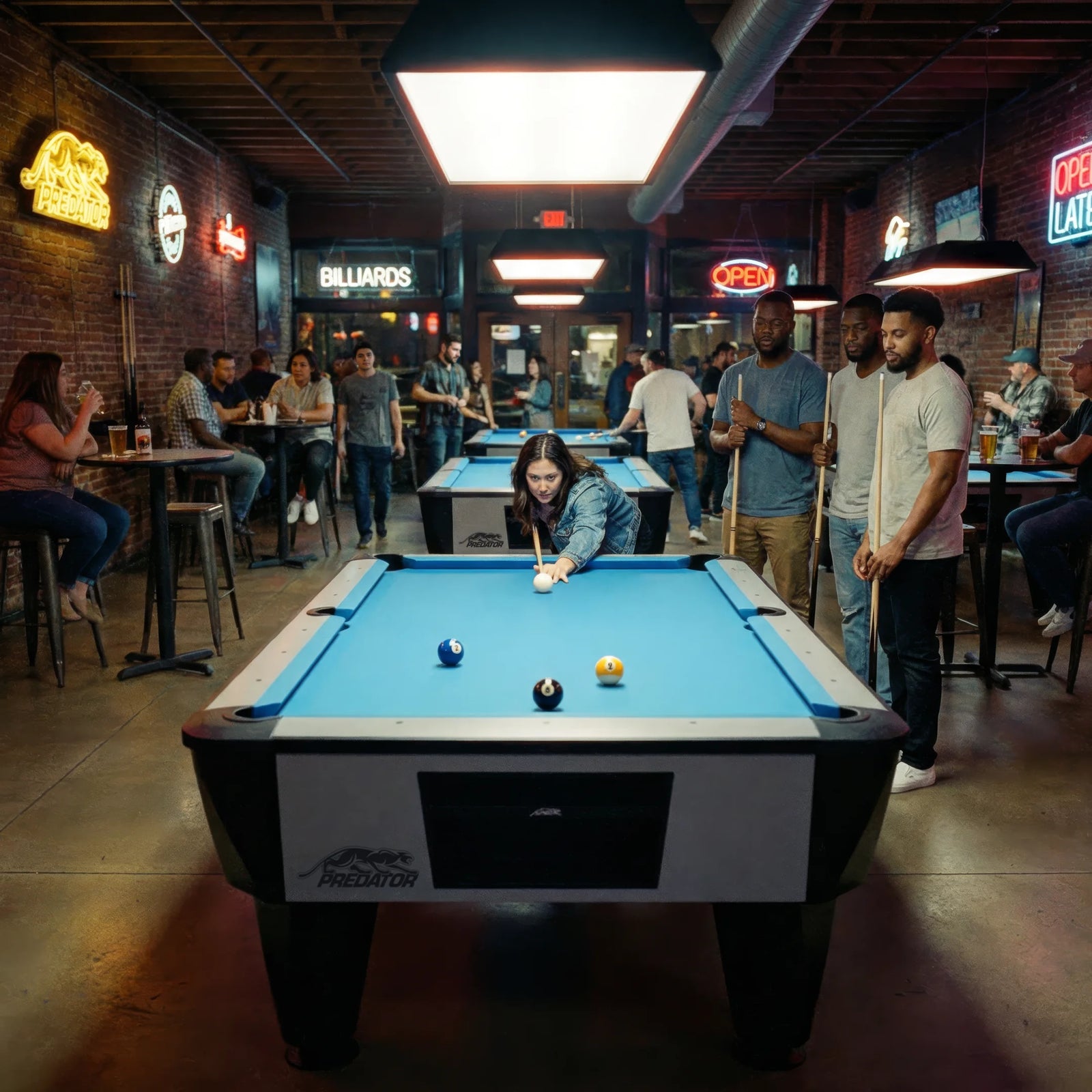 Woman Playing at a Predator Coin-Op Pool Table