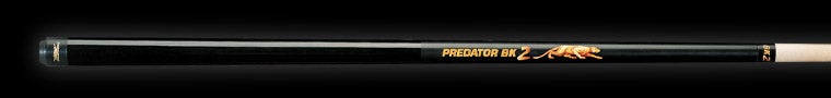 Black pool cue with 'Predator' branding 